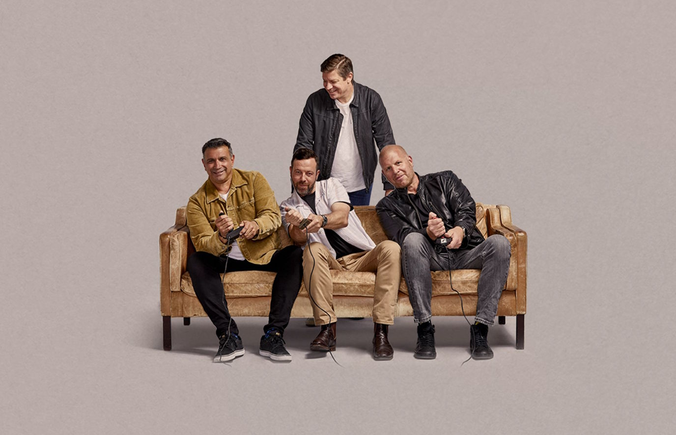 couch, people, person, shoe, adult, male, man, coat, bench, groupshot