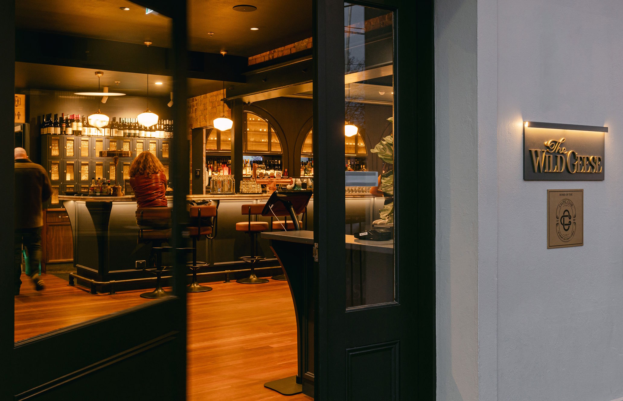 pub, person, indoors, restaurant, cafe, lamp, shop