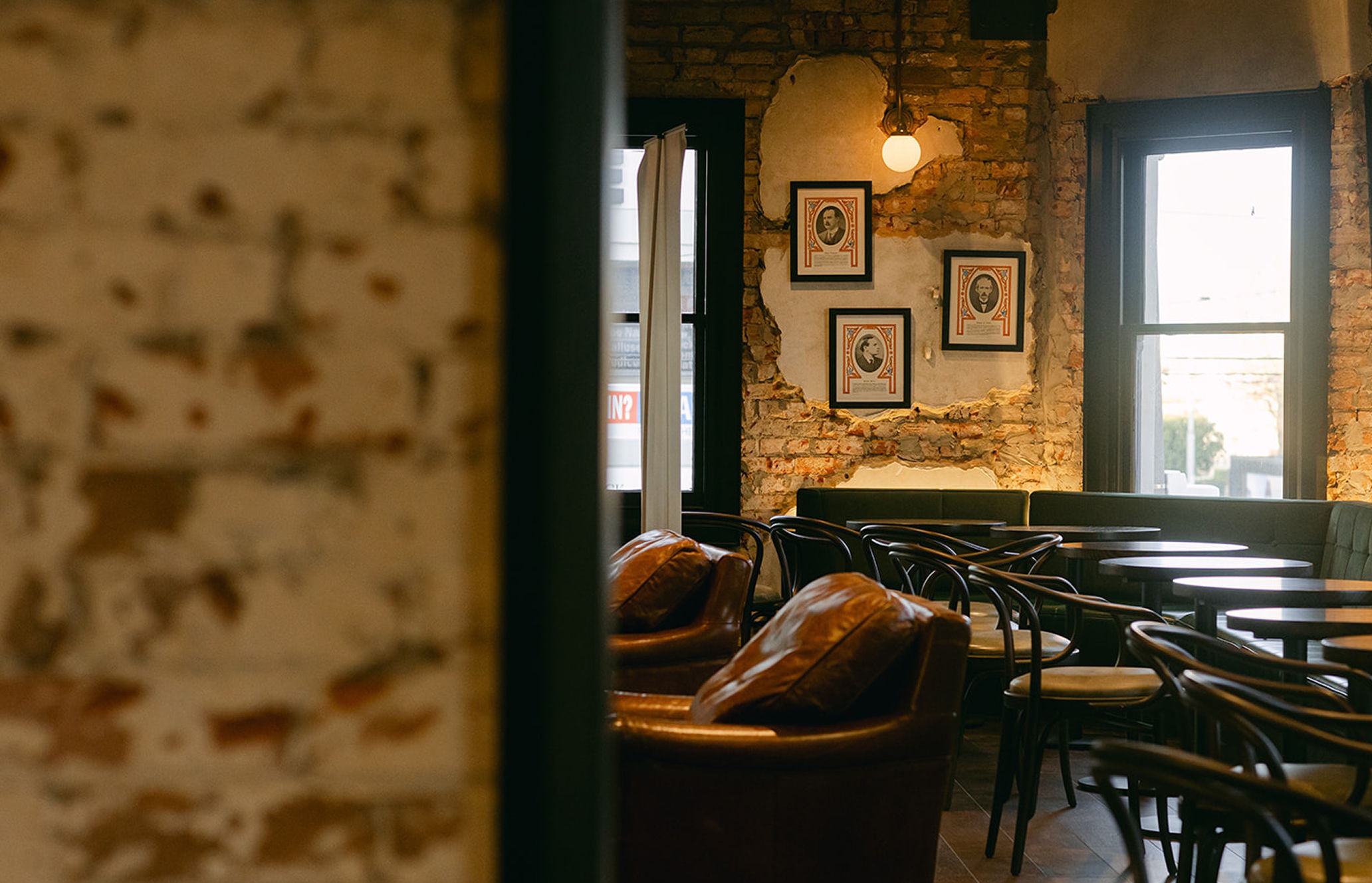 indoors, restaurant, cafe, cafeteria, painting, bread, interior design, furniture, lamp, dining room